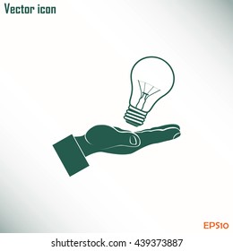 Lightbulb in hand icon vector