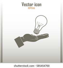 Lightbulb in hand icon vector