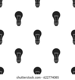 Lightbulb icon in black style isolated on white background. Light source pattern stock vector illustration
