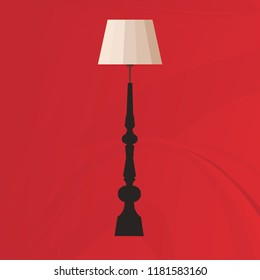 light-colored floor lamp on a red background