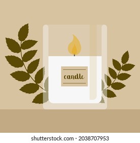 Lighted candle in a glass.