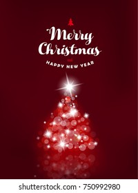 Lighted up Christmas tree with many lensflares on red background and Merry Christmas wishes.