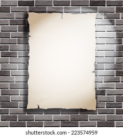 lighted a piece of paper on white brick wall background