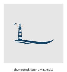 el logotipo del faro en la playa