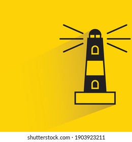 lighthouse with shadow on yellow background