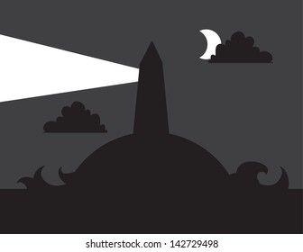 Lighthouse silhouette with light turned on 