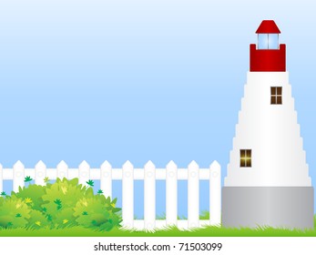 The lighthouse stands on a green meadow with white fence
