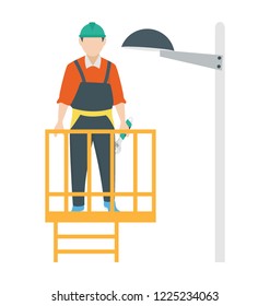 
A lighting technician to repair street lights 
