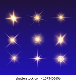 Lights sparkles isolated. Vector illustration of yellow glowing lens flares and sparks, blue background.