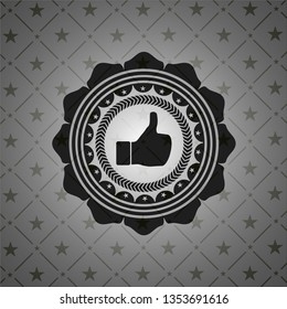 like icon inside black emblem