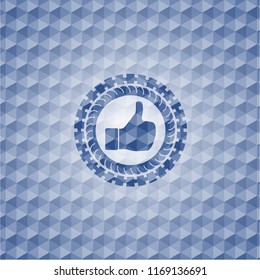 like icon inside blue emblem with geometric pattern.