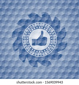 like icon inside blue emblem with geometric pattern background.