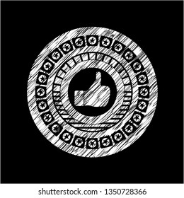 like icon inside chalk emblem written on a blackboard