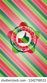 like icon inside christmas colors style badge.