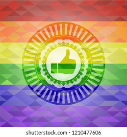 like icon inside emblem on mosaic background with the colors of the LGBT flag