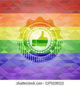 like icon inside emblem on mosaic background with the colors of the LGBT flag