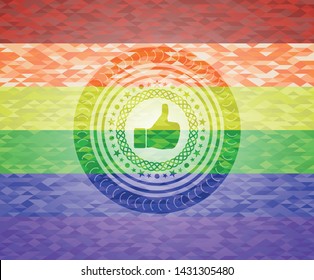 like icon inside emblem on mosaic background with the colors of the LGBT flag