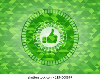 like icon inside green emblem with mosaic background
