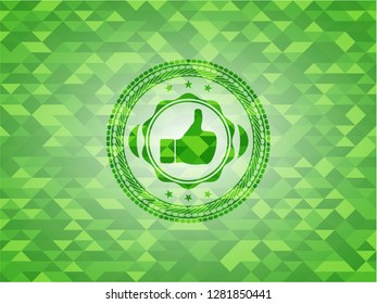 like icon inside green mosaic emblem