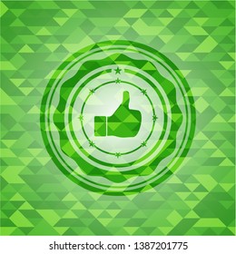 like icon inside green mosaic emblem
