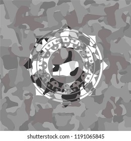like icon inside grey camouflaged emblem