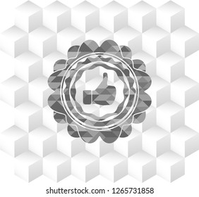 like icon inside grey emblem with cube white background