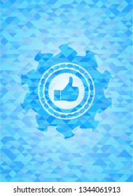 like icon inside light blue emblem with triangle mosaic background