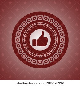 like icon inside realistic red emblem
