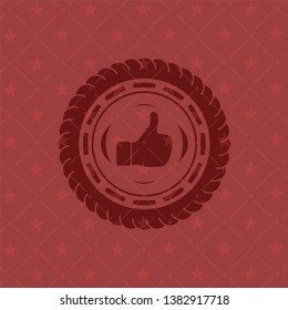like icon inside retro red emblem