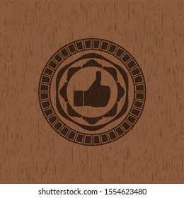 like icon inside retro style wood emblem
