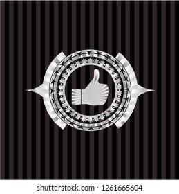 like icon inside silver emblem