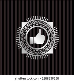 like icon inside silver emblem