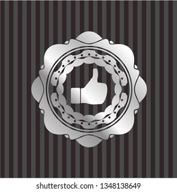 like icon inside silvery emblem