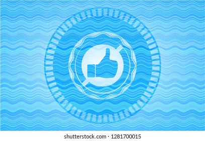 like icon inside sky blue water badge background.