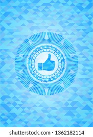 like icon inside sky blue emblem with mosaic background