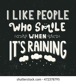 I like people who smile when It's raining. Quote. Hand drawn vintage illustration with lettering. Isolated on black background.This illustration can be used as a print on t-shirts, posters.