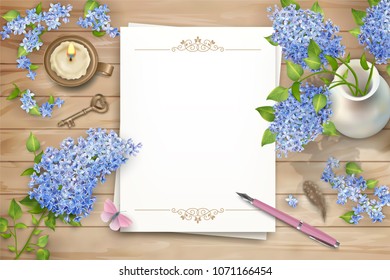 Lilac on wooden background. Spring top view composition with blank sheets of paper, pen, brass key, candle and blossoming tree branches in a ceramic vase