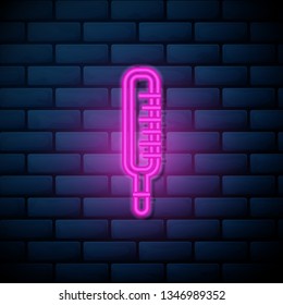 Lilac pink neon sign on brick wall Thermometer icon design related to meteorology, hot and cool, warm and freeze.