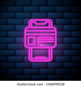 Lilac pink neon sign on brick wall Online mobile payment concept with credit card icon