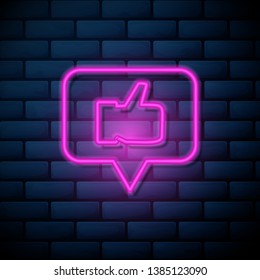 Lilac pink neon sign on brick wall Thumbs up like icon. Social media icon