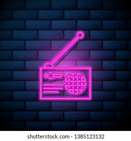 Lilac pink neon sign on brick wall Radio vector icon