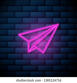 Lilac pink neon sign on brick wall Paper plane icon vector. Send Message