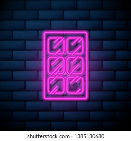 Lilac pink neon sign on brick wall Makeup powder icon, cosmetic concept for your design.