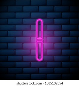 Lilac pink neon sign on brick wall Nail file icon, manicure tools, manicure supplies