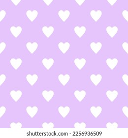 Lilac and white simple heart all over pattern. Seamless vector love print suitable for fashion, home decor and stationary.