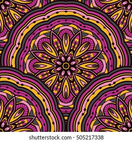 Lilac and yellow seamless pattern of mandalas. Ornament of round decorative elements. Ethnic background with stylized abstract plates. Template for curtain, textile, linen, carpet.