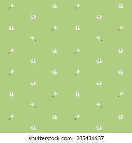 Lilies sparse pattern over light green