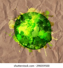 Lime made of colorful splashes on a crumpled paper background 
