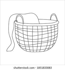 Line art decorative wicker basket with a blanket. Modern hand drawn outline illustration decoration for home interior, hygge scandinavian style, trendy drawing. creative design. isolated on white