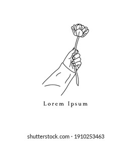 line art drawing. Hand holding flower. Vector illustration